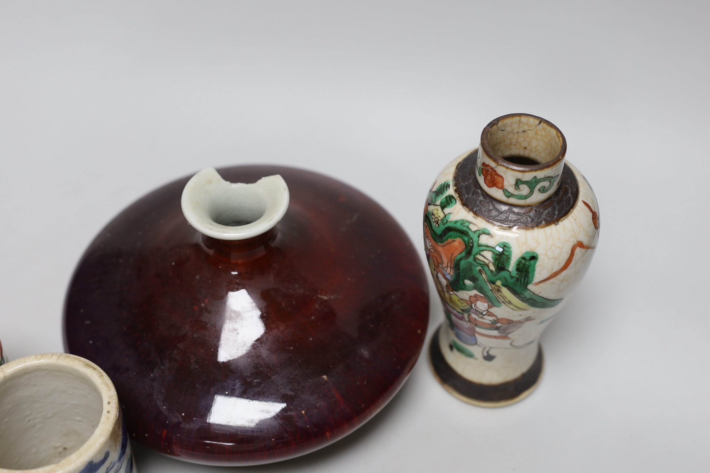 A Chinese sang de boeuf glazed squat vase, a crackle ware vase, a box and cover and a blue and white brush pot, tallest 18.5cm high